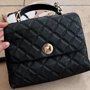 Likely used Kate Spade bag